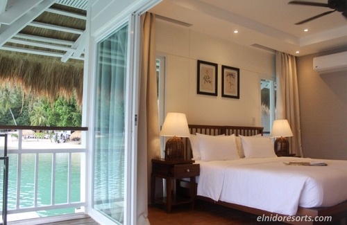 Taytay Cabaña | Beautiful 5 Star Loft Water Cottage with Sea Views on Apulit Island Resort, El Nido Cottage 1002
