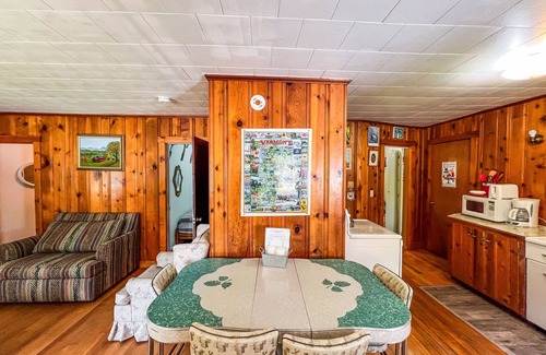 Wells Cabaña | Beautiful and serene cottage with beach, dock, lake views, fishing, and A/C