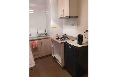 Concepcion Casa | Hermoso y cálido departamento con estacionamiento