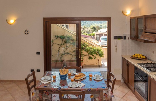 Porto Pollo Apartamento | Bonito apartamento para 4 personas con WIFI, TV, terraza, mascotas permitida y aparcamiento