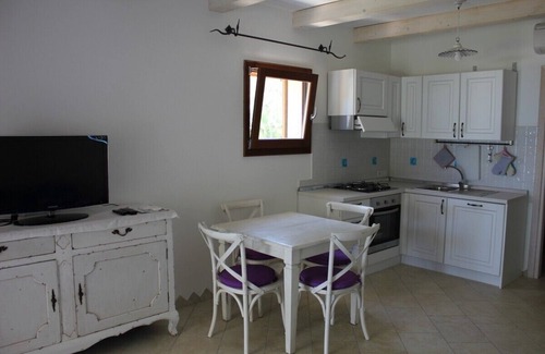 Cala Liberotto Apartamento | Precioso apartamento en un chalet en el mar y acceso directo a la playa