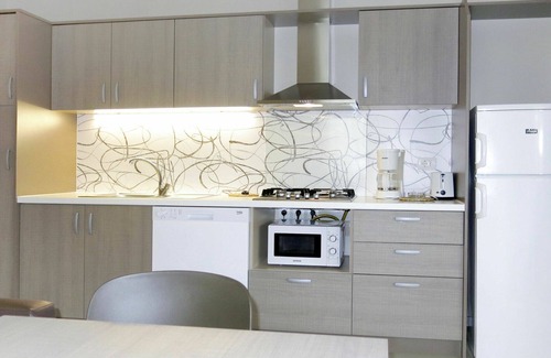 Grado Casa | Precioso apartamento en villa para 5 personas con A/C, piscina, WIFI, terraza y aparcamiento