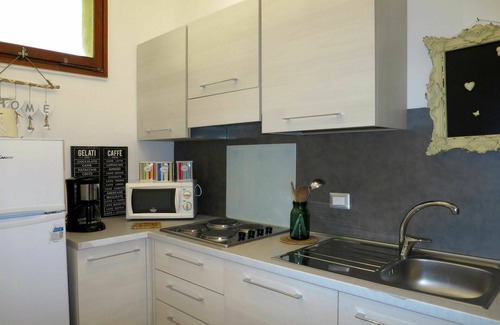 Brezzo di Bedero Apartamento | Bonito apartamento para 4 personas con piscina, WIFI, TV, patio, mascotas permitida y aparcamiento