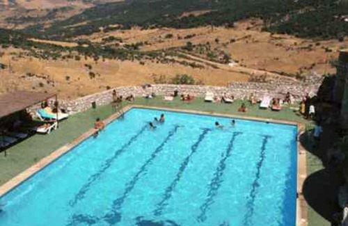 Grazalema Apartamento | Precioso apartamento, vistas a los tejados de la aldea de montaña.