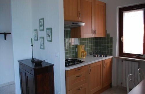 Gardola Casa | Hermoso bungalow con una maravillosa vista del lago y una gran terraza.