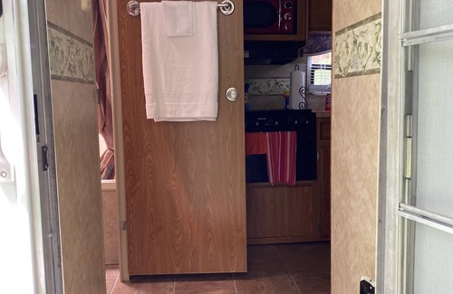 Dewittville Casa | Beautiful Camper on a country road.