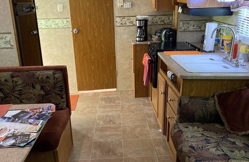 Dewittville Casa | Beautiful Camper on a country road.