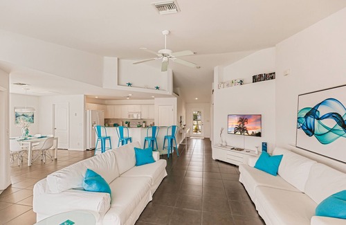 Trafalgar Casa | Beautiful Cape Coral Home, Outdoor Oasis with Heated Pool on a Freshwater Canal!