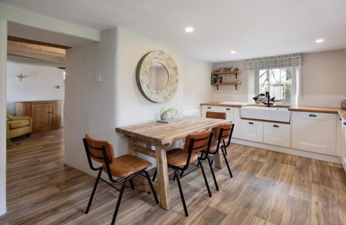 St Mellion Casa | Beautiful character thatched farmhouse overlooking St Mellion golf course