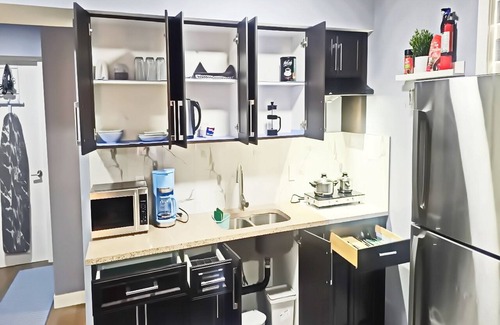 Airdrie Apartamento | Beautiful, cozy and comfy suite.