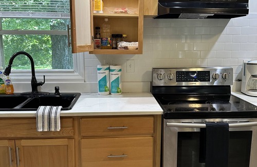 Poughkeepsie Casa | Beautiful creekside secluded cottage with canoeing on site. Pet friendly.