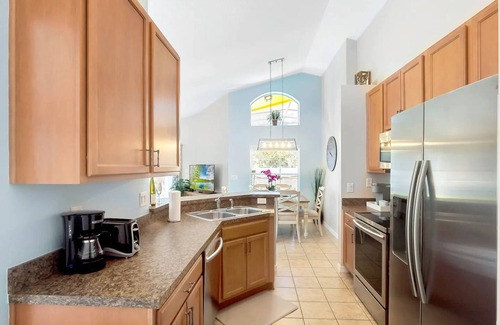 Kissimmee Casa | Beautiful Disney Home! Heated Pool/Spa Arcade Gated Community 4BR/3BA