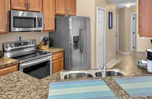 Kissimmee Casa | Beautiful Disney Home! Heated Pool/Spa Arcade Gated Community 4BR/3BA