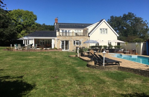 Village de Putron Casa | Beautiful five bedroomed family home in Guernsey with heated pool