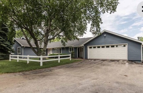 Iowa City Casa | Beautiful home nestled on almost 2 acres in the city.
