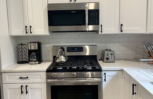 Springs Casa | Beautiful Home with walking distance to the beach, new 46ft pool! EV charger