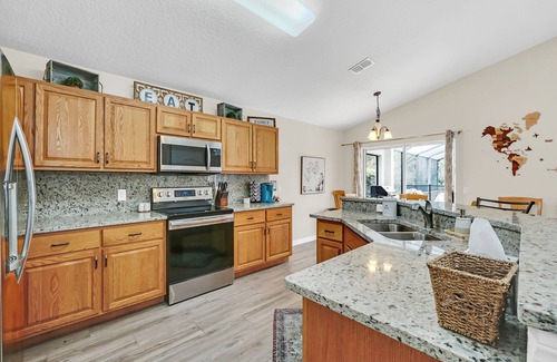 Cumbrian Lakes Casa | Beautiful home with a private pool. Close to Disney and pet friendly.