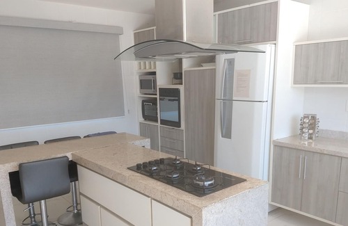 Camburi Casa | Casa con piscina, hidromasaje y barbacoa.