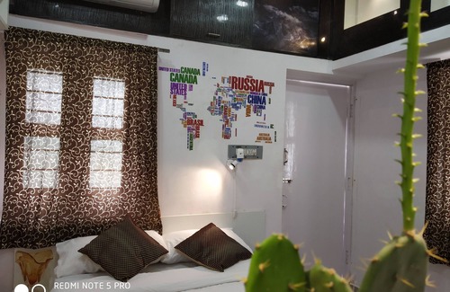Mysore Hotel | Hermosas habitaciones rodeadas de naturaleza en el corazón de Mysore
