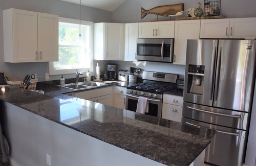 Carova Beach Casa | Beautiful Secluded Carova Beach House - Hot tub - Pet yard with access door