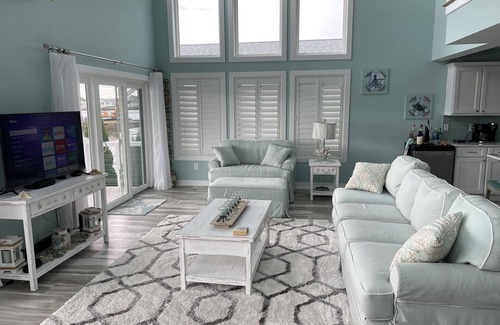 Montego Bay Casa | Beautiful, single home on a wide canal with boat slip and large pier.