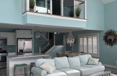 Montego Bay Casa | Beautiful, single home on a wide canal with boat slip and large pier.