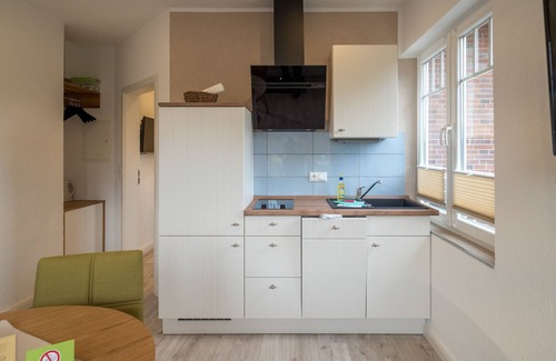 Spiekeroog Apartamento | Beautiful small apartment in the east of the village with south-facing terrace!