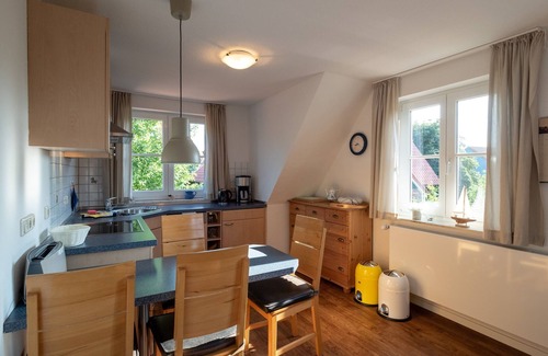 Spiekeroog Apartamento | Beautiful top floor vacation apartment in the east of the island with garden use