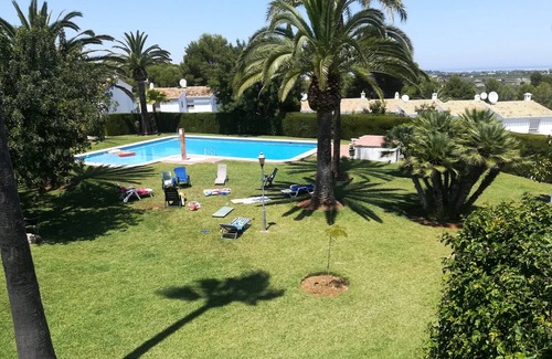 Pedreguer Apartamento | Bonito adosado, confortable y exterior, con vistas al jardín.