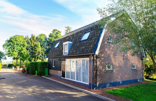 Goudriaan Casa | Casa de vacaciones "De Rijtuigenschuur" en el centro de los Países Bajos