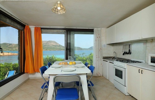 Costa Corallina Casa | Preciosa casa de vacaciones para 6 personas con WIFI, TV, patio y aparcamiento