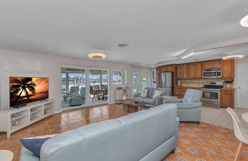 Port Charlotte Casa | Beautiful Waterfront House with Heated Pool and Fishing Dock
