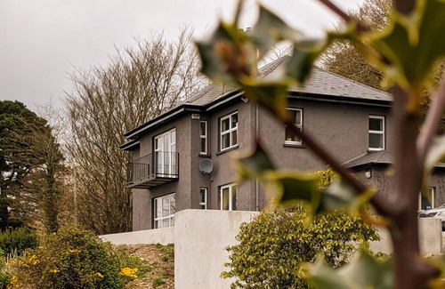 Ringaskiddy Casa | Beautifully appointed waterfront 4 bedroom house with private access to Woods