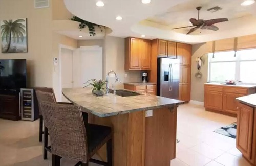 Pelican Casa | Beautifully maintained 4 bed/2 bath on canal w/pool & sailboat access