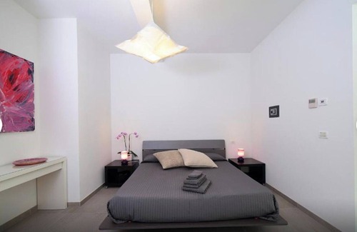 Palazzolo dello Stella Cama Y Desayuno | Bed and Breakfast Loggia degli Artisti 'Habitación Cuádruple Deluxe' con piscina y aire acondicionado
