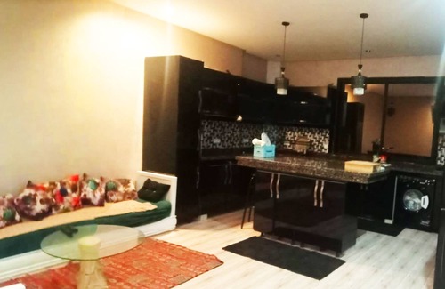 Gueliz Apartamento | Bed in Shared rooms with free kitchen & lounge.