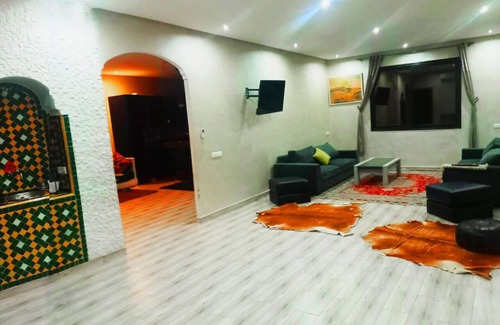 Gueliz Apartamento | Bed in Shared rooms with free kitchen & lounge.