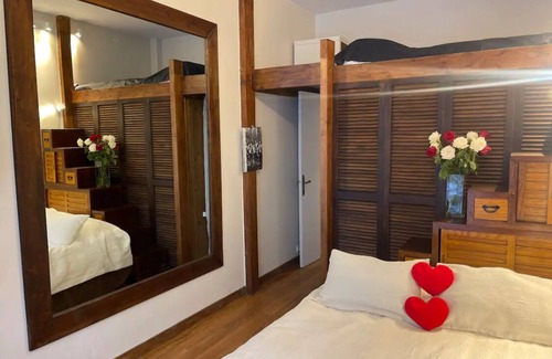Porte-Dauphine Casa | Bedroom and small study on veranda overlooking quiet garden
