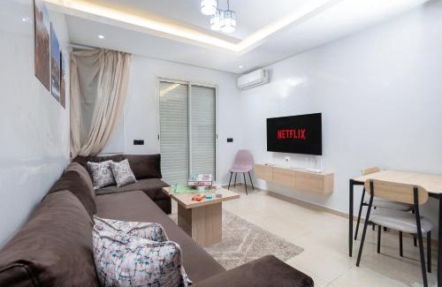 Cite Al Mohammadi Apartamento | Bel appartement piscine, 10 min stadium, souk, plage, bein sports