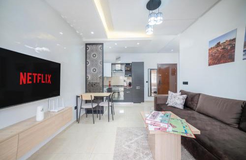 Cite Al Mohammadi Apartamento | Bel appartement piscine, 10 min stadium, souk, plage, bein sports