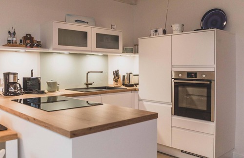 Rysum Apartamento | "Bente" cozy maisonette apartment with terrace in the historic Gulfhof