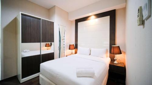 Surabaya Apartamento | Best Location and Tidy 2BR Apartment at Trillium Residence By Travelio