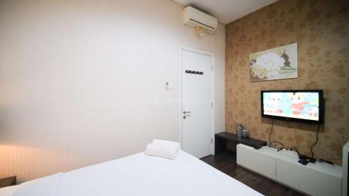Surabaya Apartamento | Best Location and Tidy 2BR Apartment at Trillium Residence By Travelio