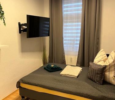 Wittenberge Apartamento | Best Preis Stadtperle 1- Stadtzentrum Wittenberge Modernes Ambiente max 3 Personen Einzelzimmer voll ausgestattet mit MagentaTV, WLAN, Waschmaschine