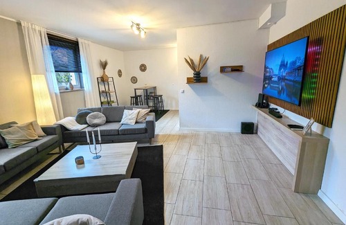 Wildeshausen Apartamento | BesTime - 5 Schlafzimmer, Wohnzimmer, Küche, Waschtrockner, Terrasse, Smart-TVs, Netflix, Tischfußball