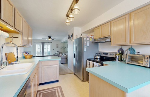 Ocean View Casa | Bethany Marina dog friendly bayfront townhouse w/pool, balcony, grill