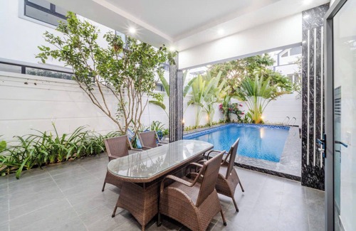 Vung Tau Villa | Jardín junto al mar en la playa de Long Cung.