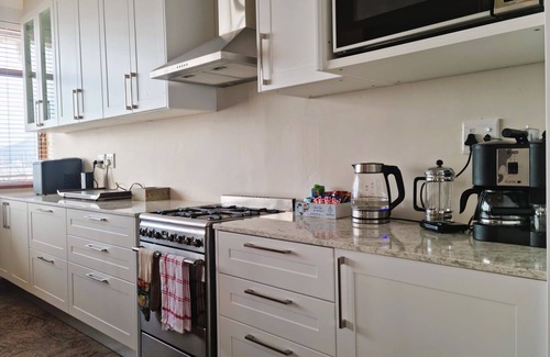 Gordons Bay Central Casa | 'Bikini Beach Holiday Home' - 4 Bedroom Beachfront Accommodation with Ocean View