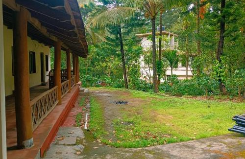 Kanbylu Baichanalli Apartamento | Birds Valley Estate stay by dew Drops
