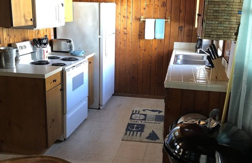 Kitty Hawk Cabaña | BlackBeard's Retreat - Historic and Pet Friendly by RedAwning